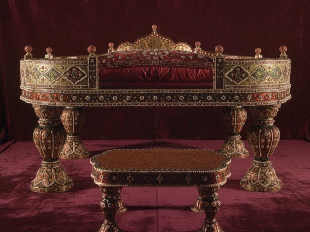 The lavish Throne of Nader Shah, an opulent masterpiece of Indian and Persian craftsmanship gifted to the Ottoman Sultan, adorned with intricate enamel, pearls, and precious gems.