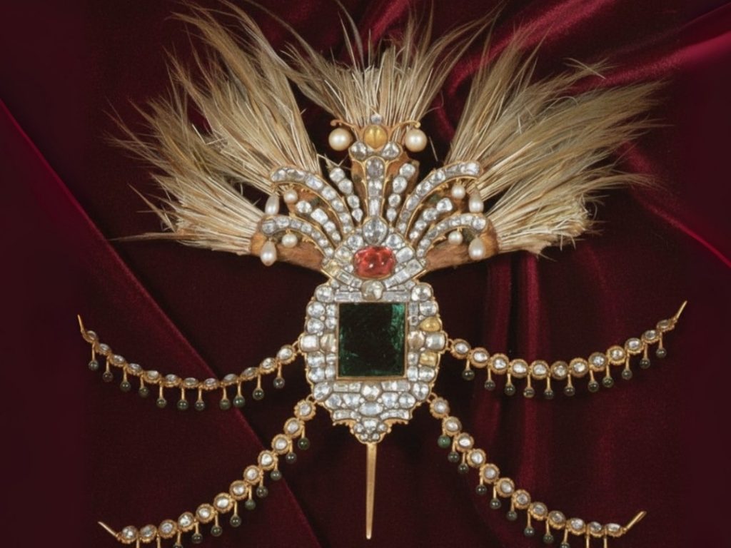 The magnificent plumed aigrette (Sorguç) of the Ottoman Sultans, a dazzling masterpiece from the Imperial Treasury, symbolizing the ruler's absolute authority with its large emerald, cascading diamonds, and pearls.